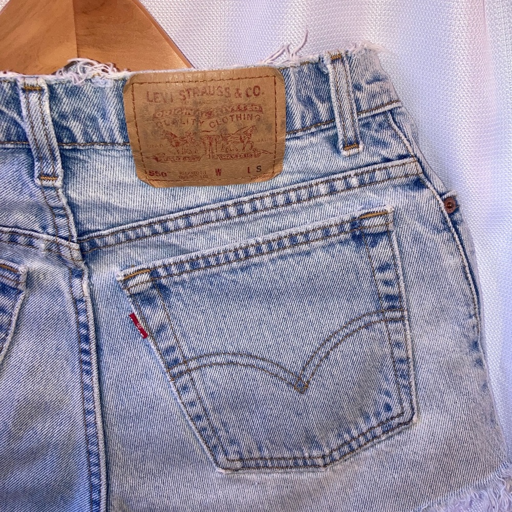 High waisted, light wash Levi’s shorts